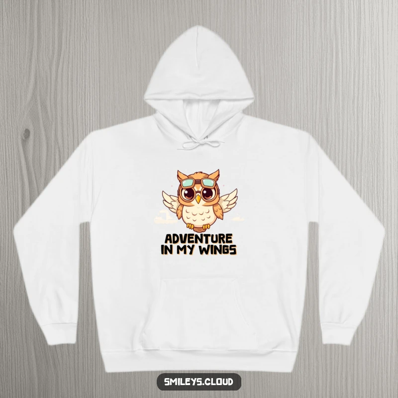 Funny and warm hoodie depicting a cute owl wearing aviator goggles, soaring through fluffy clouds, ideal for funny adventures.