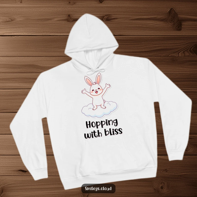 Funny and soft hoodie featuring a cheerful bunny balancing on a cloud with arms outstretched, perfect for funny comfort.