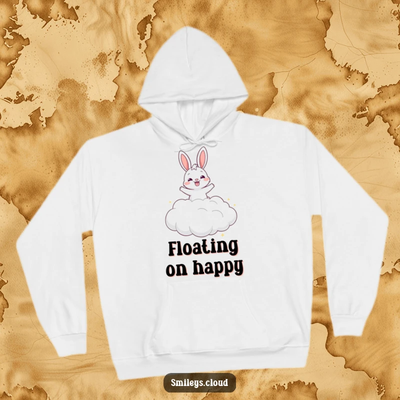 Funny grinning bunny happily bouncing on a cloud, featured on a warm and humorous hoodie for ultimate comfort.
