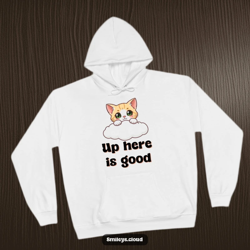Funny cat hoodie, a curious cat's wide eyes peeking over a fluffy cloud, conveying a sense of playful intrigue and comfort.