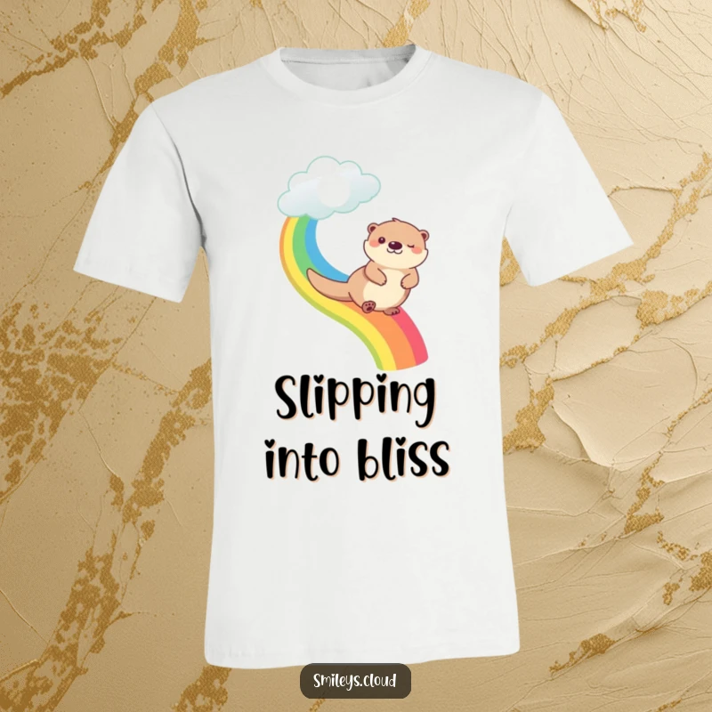 Funny happy otter sliding down a rainbow that starts from a cloud, printed on a fun t-shirt.