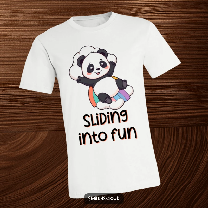 Funny Panda t-shirt depicting a playful panda sliding down a rainbow from a cloud, embodying carefree fun and colorful dreams.